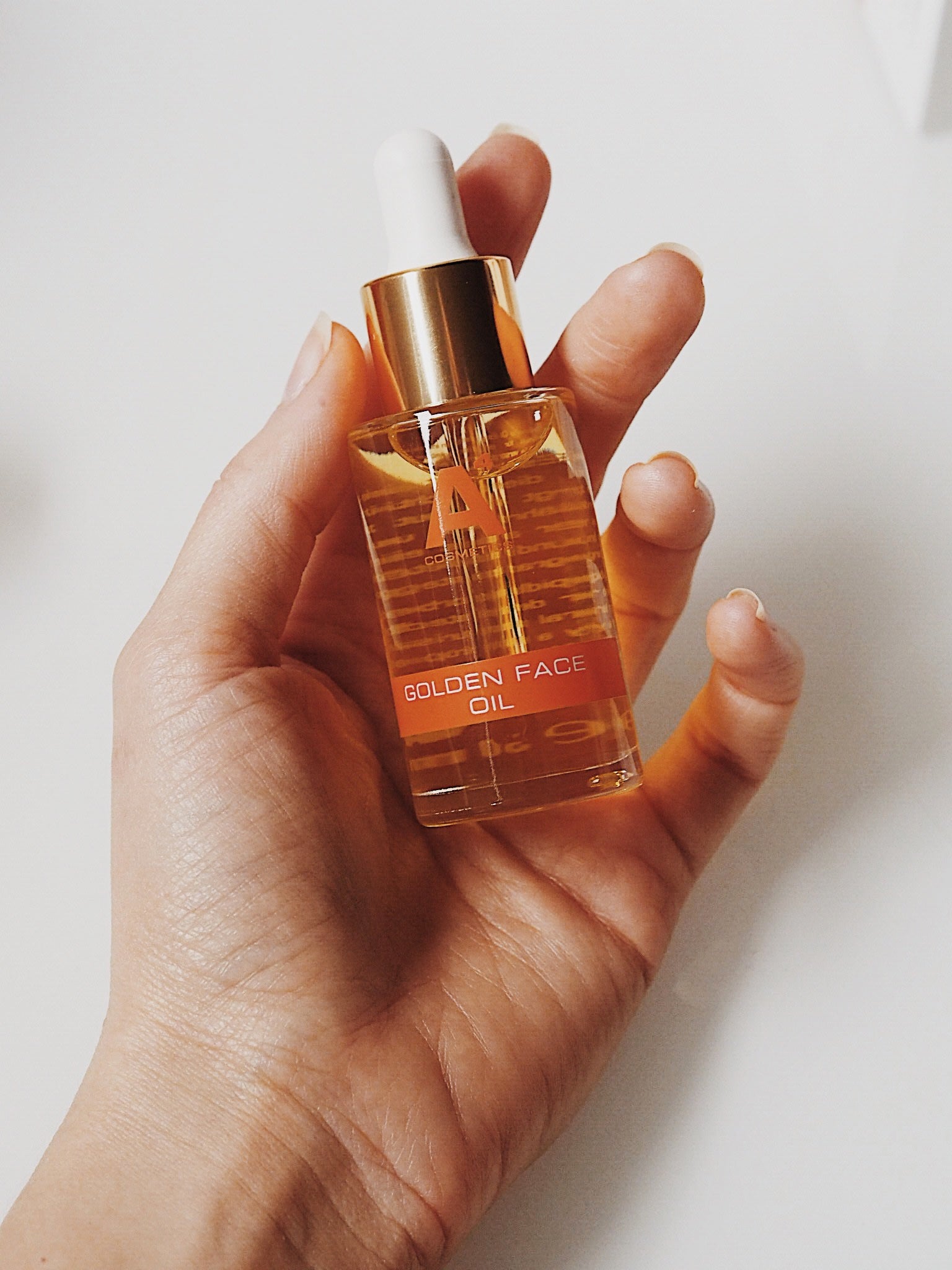 A4 Golden Face Oil | mit gratis Golden Body Oil (50ml Reisegröße)